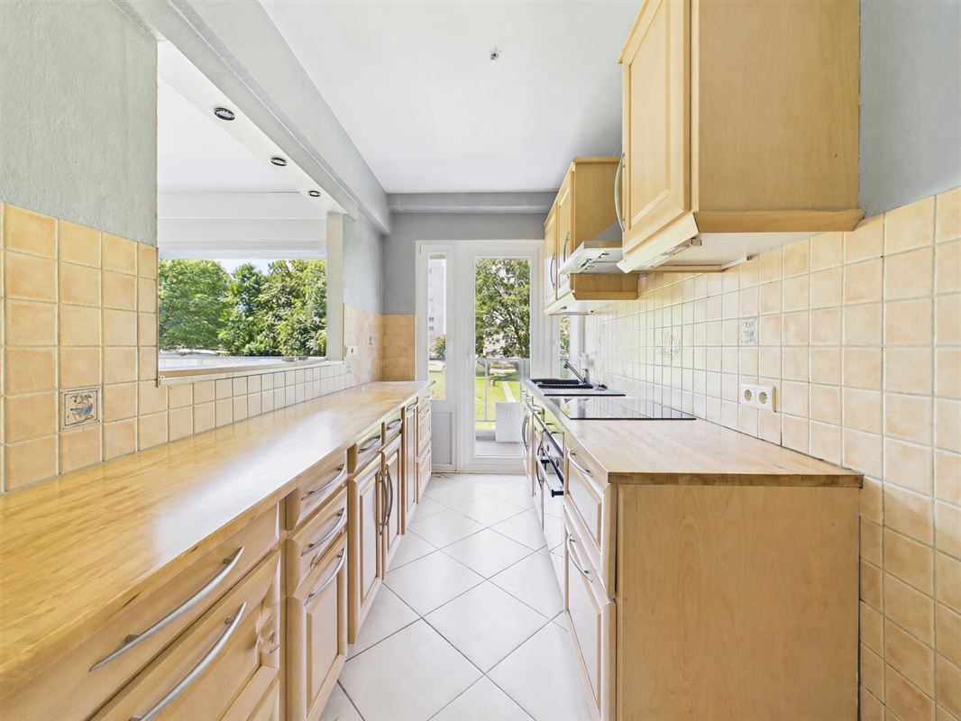 Appartement deux chambres avec cave et jardin commun