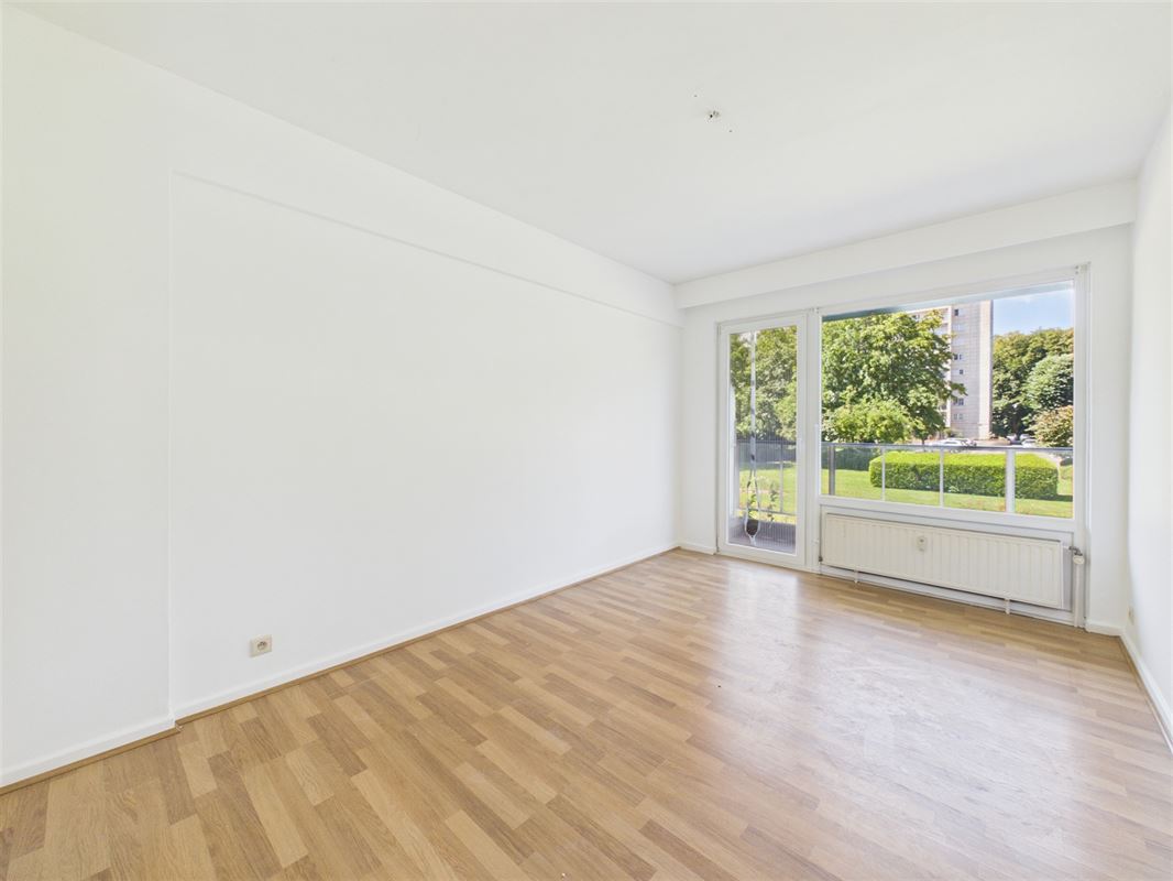 Appartement deux chambres avec cave et jardin commun