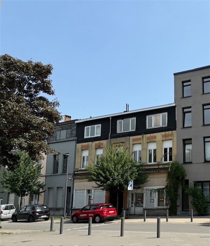 Dubbele meergezinswoning met 7 gekende units