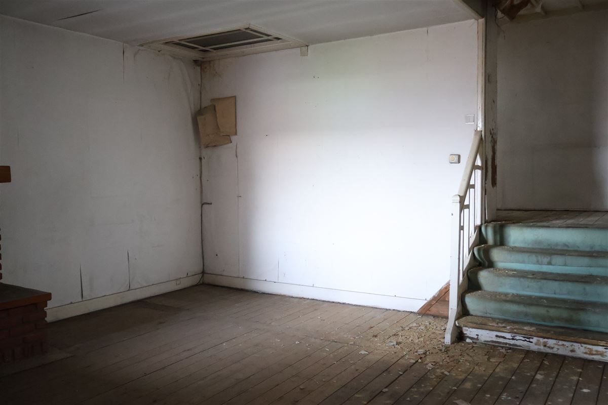 Opbrengsteigendom - handelshuis met te renoveren duplex + tuin + atelier