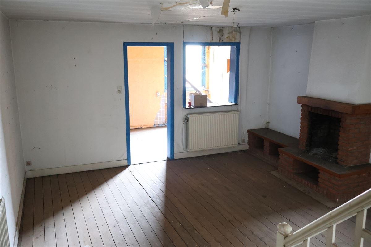 Opbrengsteigendom - handelshuis met te renoveren duplex + tuin + atelier