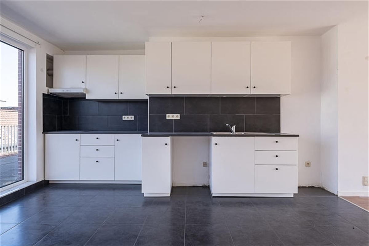 100% verhuurd opbrengsteigendom met 7 appartementen en +40 autostaanplaatsen