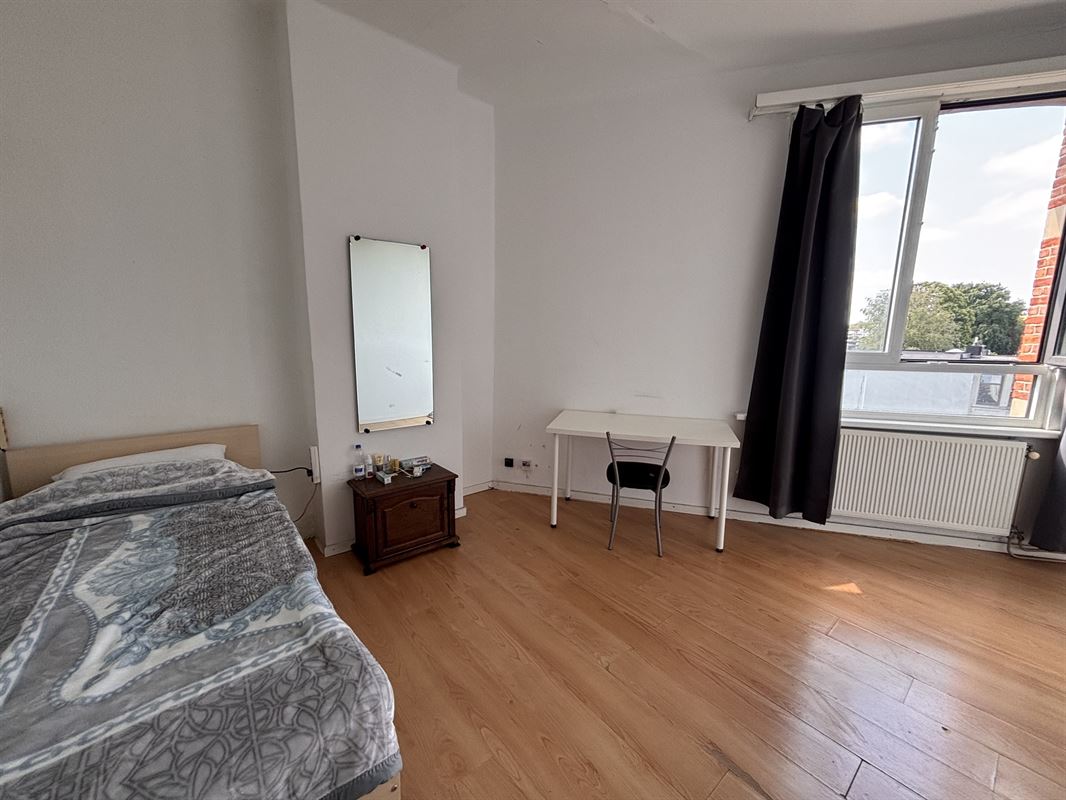 Opbrengsteigendom handelszaak + 3 appartementen