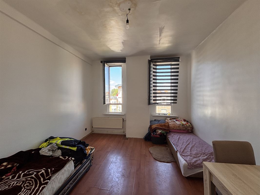 Opbrengsteigendom handelszaak + 3 appartementen