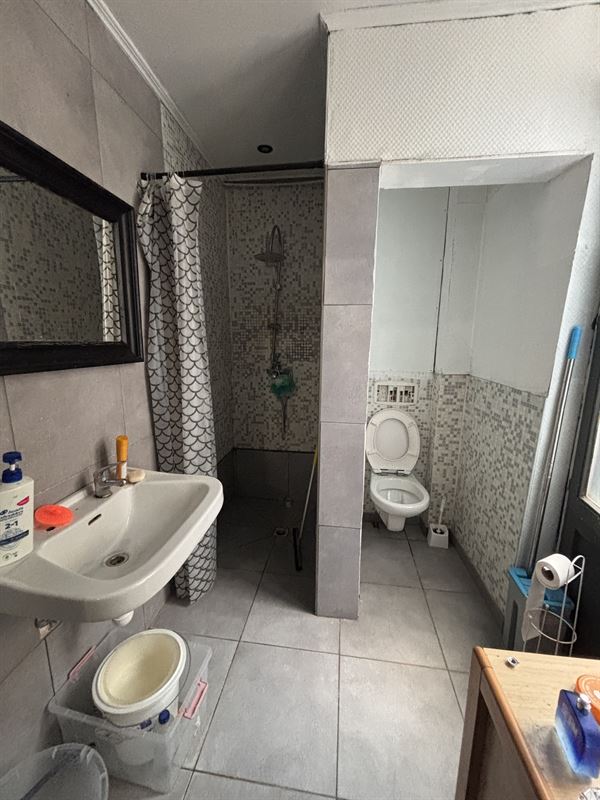Opbrengsteigendom handelszaak + 3 appartementen