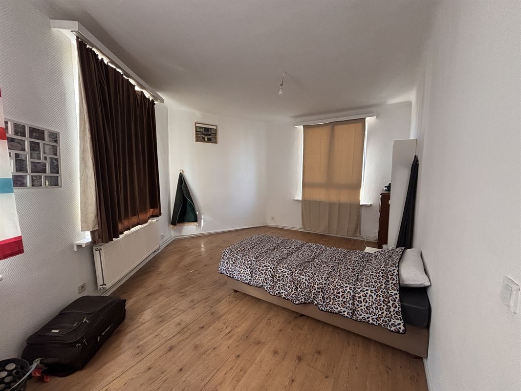 Opbrengsteigendom handelszaak + 3 appartementen