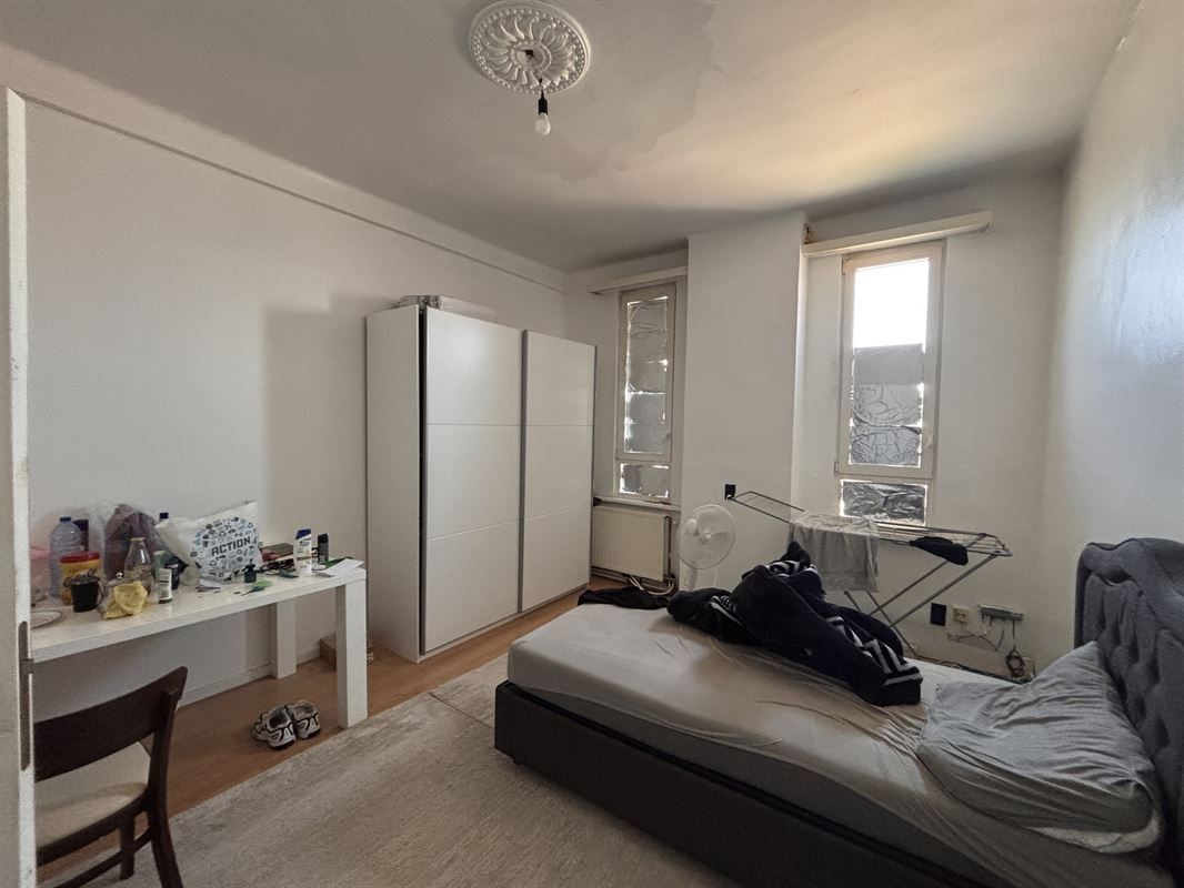 Opbrengsteigendom handelszaak + 3 appartementen