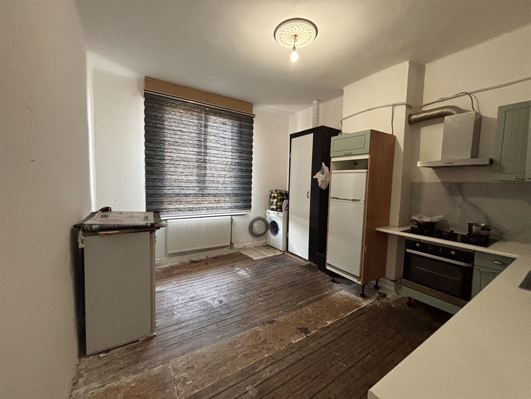 Opbrengsteigendom handelszaak + 3 appartementen