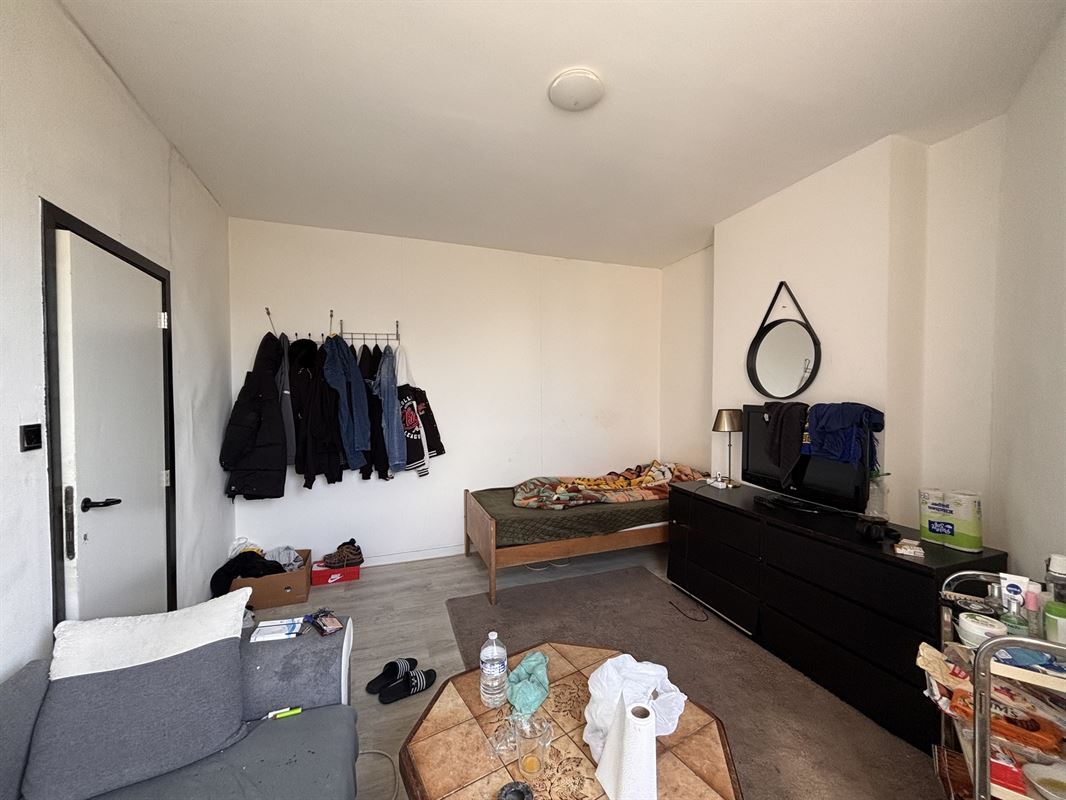 Opbrengsteigendom handelszaak + 3 appartementen