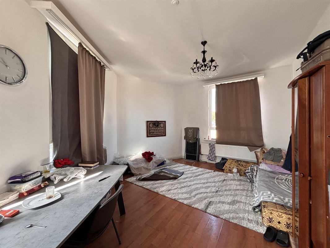Opbrengsteigendom handelszaak + 3 appartementen