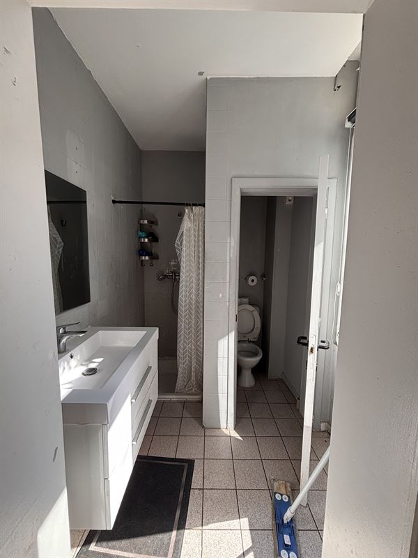 Opbrengsteigendom handelszaak + 3 appartementen