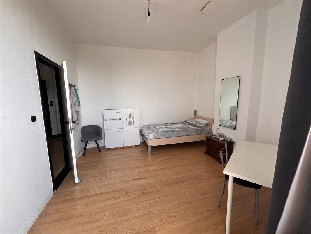 Opbrengsteigendom handelszaak + 3 appartementen