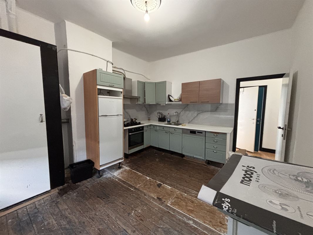 Opbrengsteigendom handelszaak + 3 appartementen