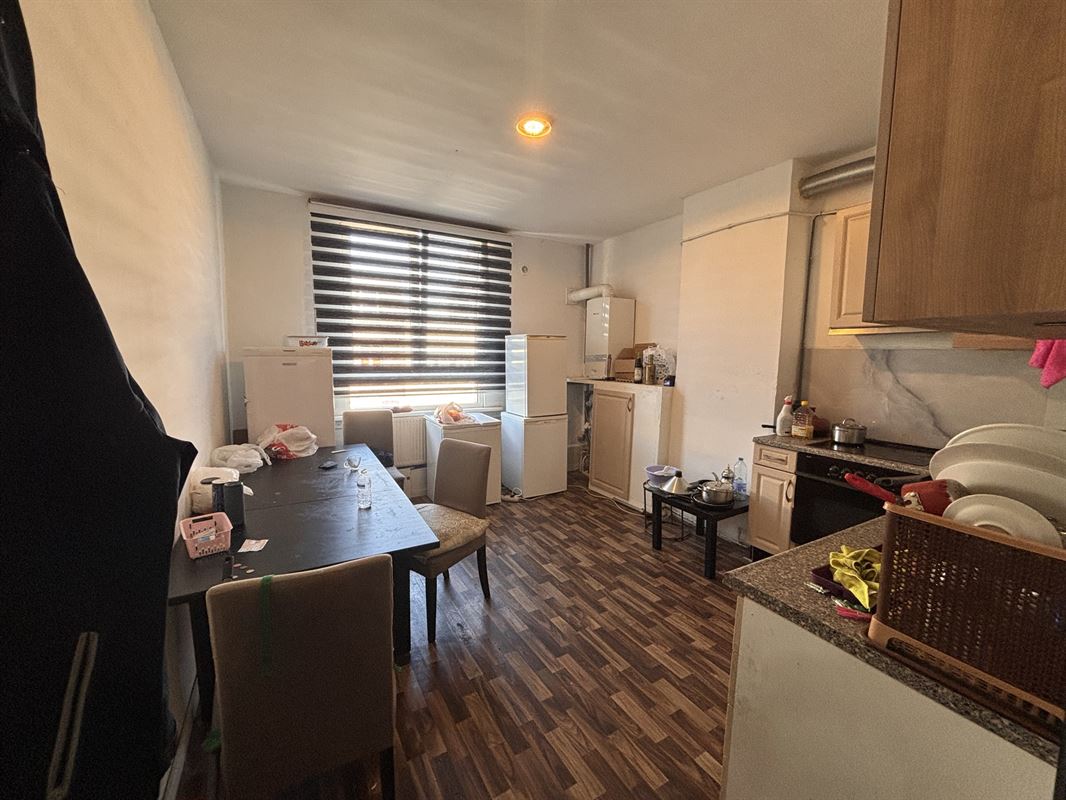 Opbrengsteigendom handelszaak + 3 appartementen