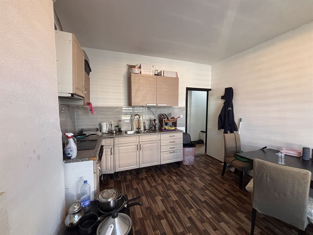 Opbrengsteigendom handelszaak + 3 appartementen