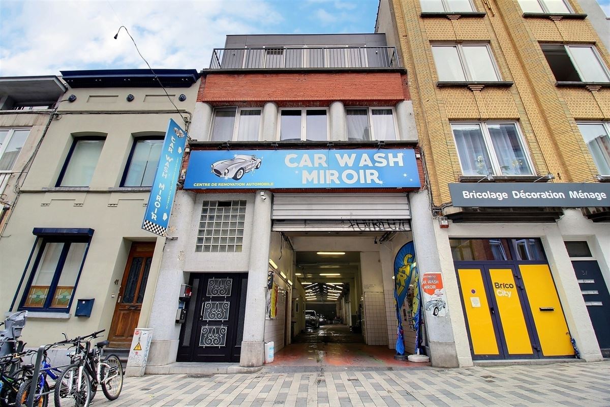 QUARTIER PLACE DU MIROIR - REZ COMMERCIAL LOUÉ A VENDRE