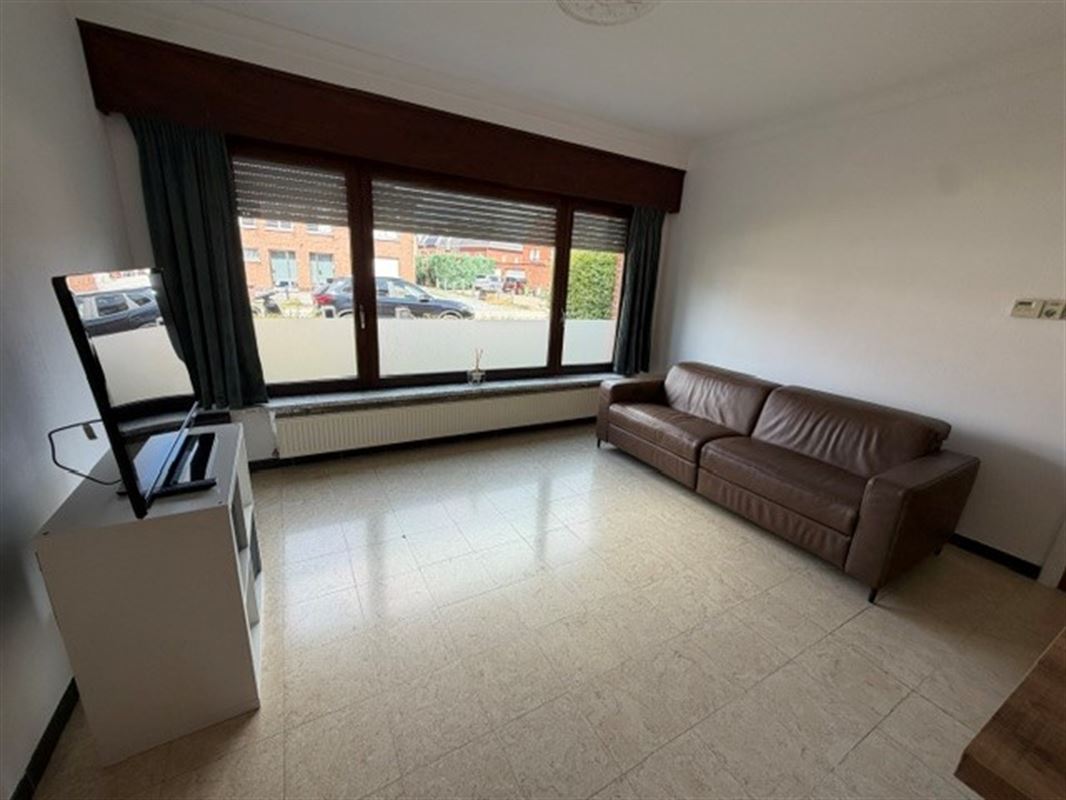 Zeer tof gelijkvloersappartement met tuin en garagebox