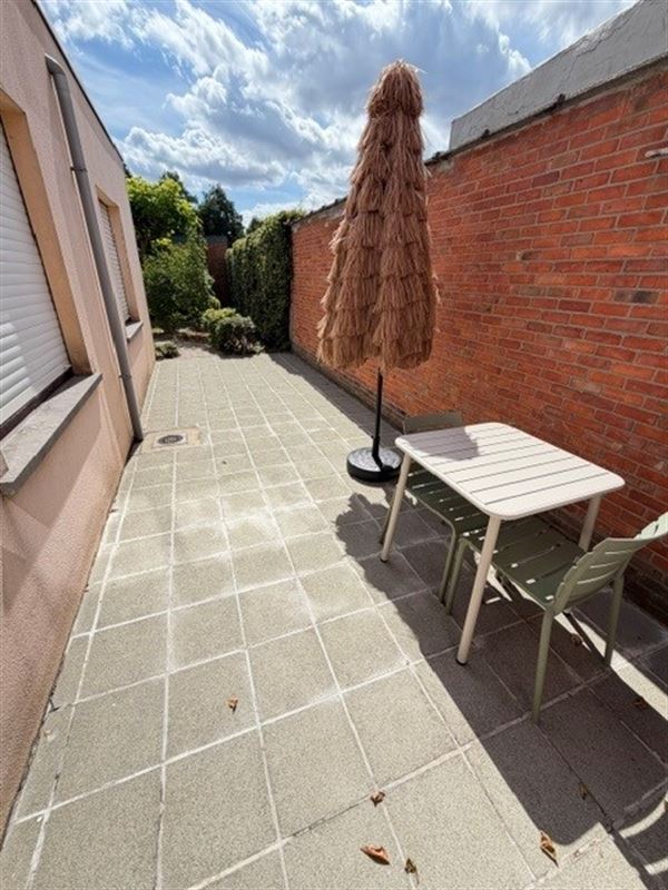 Zeer tof gelijkvloersappartement met tuin en garagebox