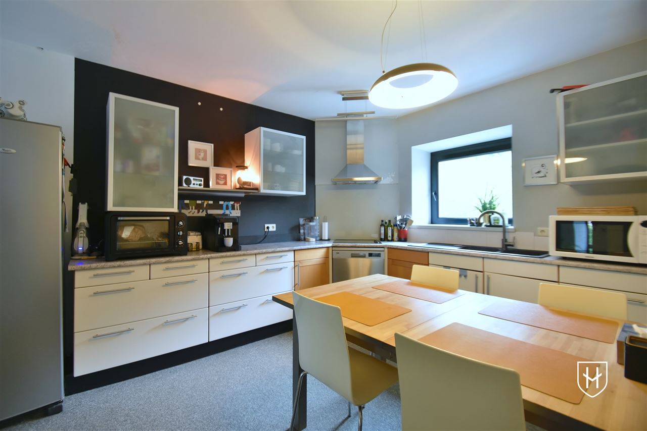 Charmante woning met garage, bosrijk gelegen te Genk