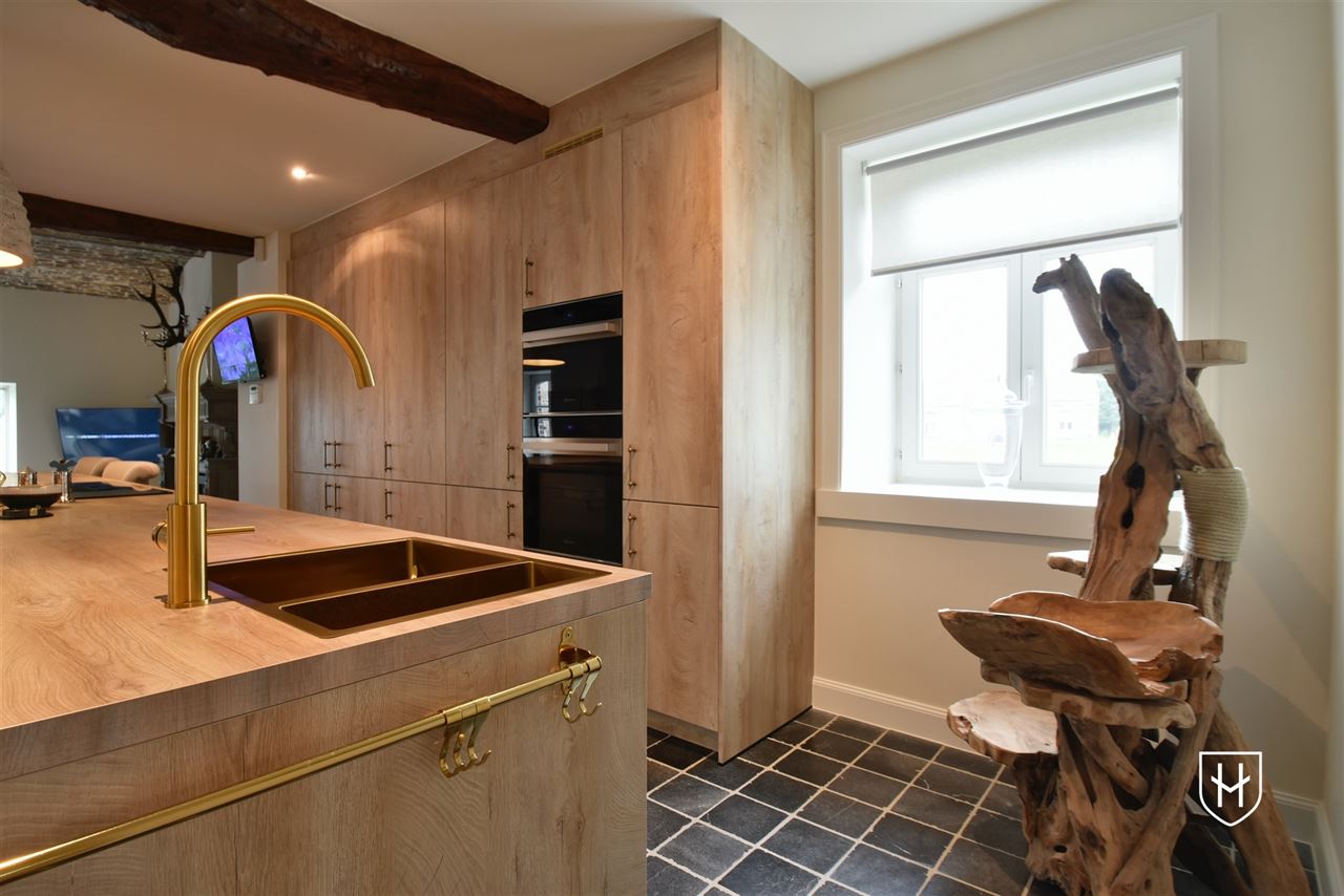 Luxueuze hoeve met schitterende binnenplaats, riante bijgebouwen en zwemvijver op een idyllische, natuurrijke locatie te Tongeren