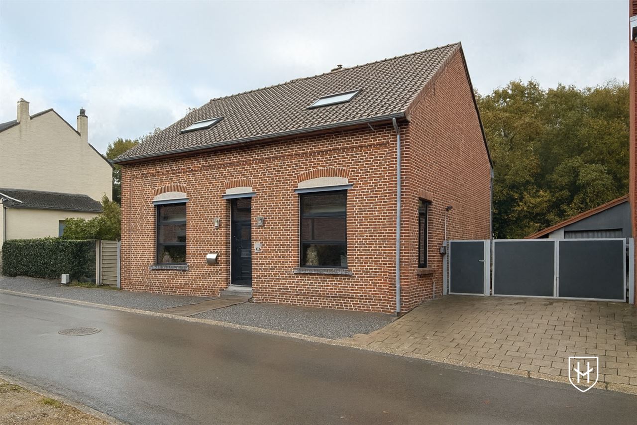 Charmante woning met garage, bosrijk gelegen te Genk