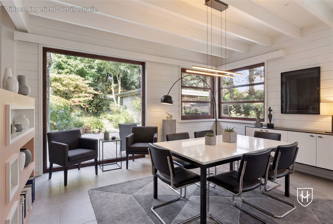 Sfeervolle woning met 2 slaapkamers en prachtig aangelegde tuin met siervijver en terras, centraal gelegen in Peer