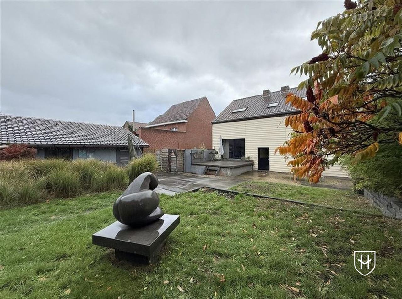 Charmante woning met garage, bosrijk gelegen te Genk