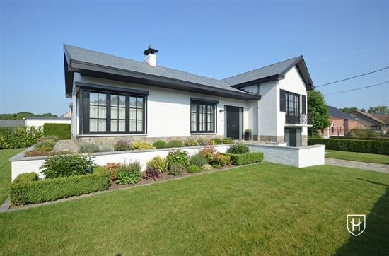 On quiet rural location located split level house on a nice plot of 08a 31ca in Beringen-Paal