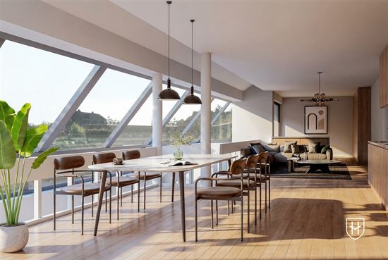 Lichtrijke handelsruimte eventueel geschikt om wonen en werken te combineren op een gunstige locatie te Maasmechelen