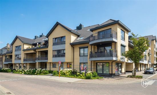 Luxueus duplex-appartement met twee badkamers en garage, rustig en centraal gelegen in Lanaken-Centrum