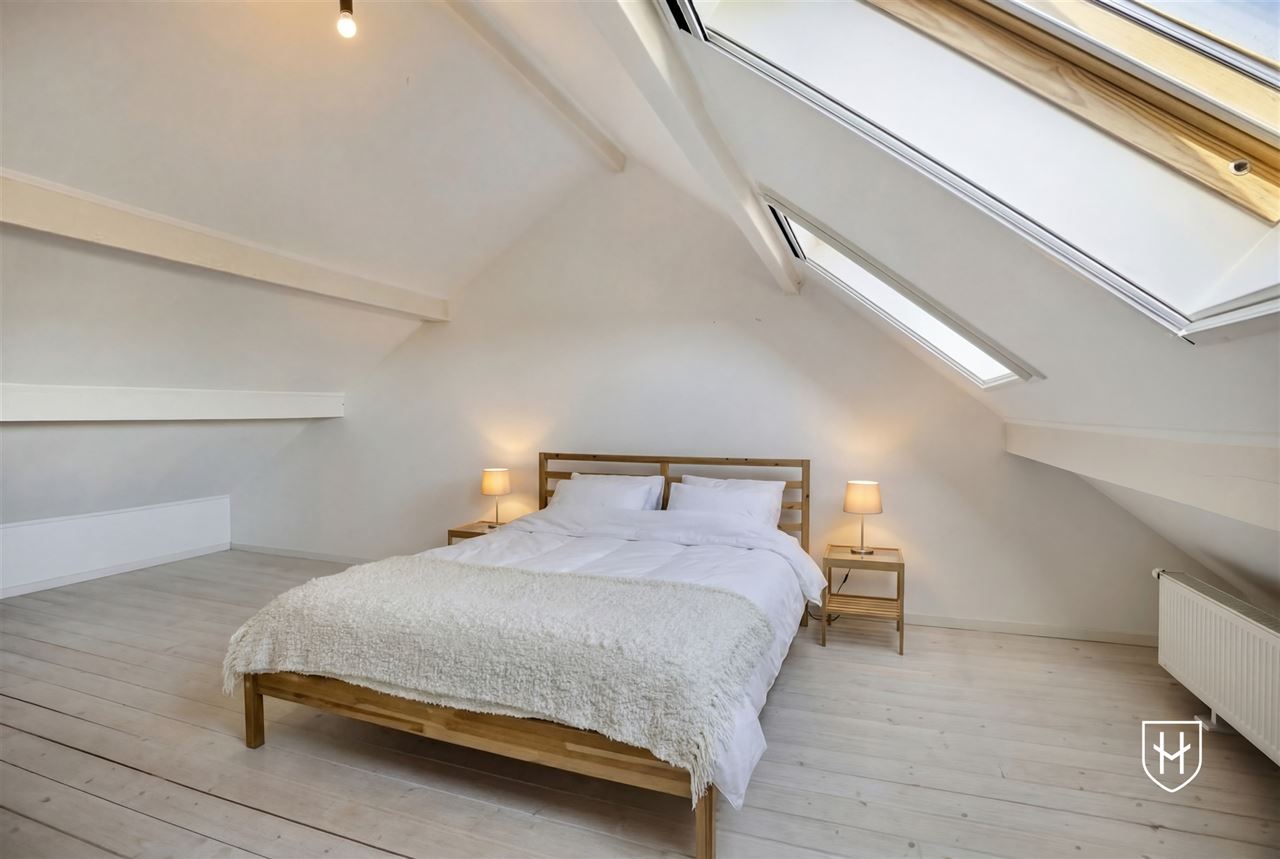 Halfvrijstaand woonhuis met zonnepanelen, 4 slaapkamers, een inpandige garage en een diepe achtertuin, rustig gelegen in Riemst-Kanne