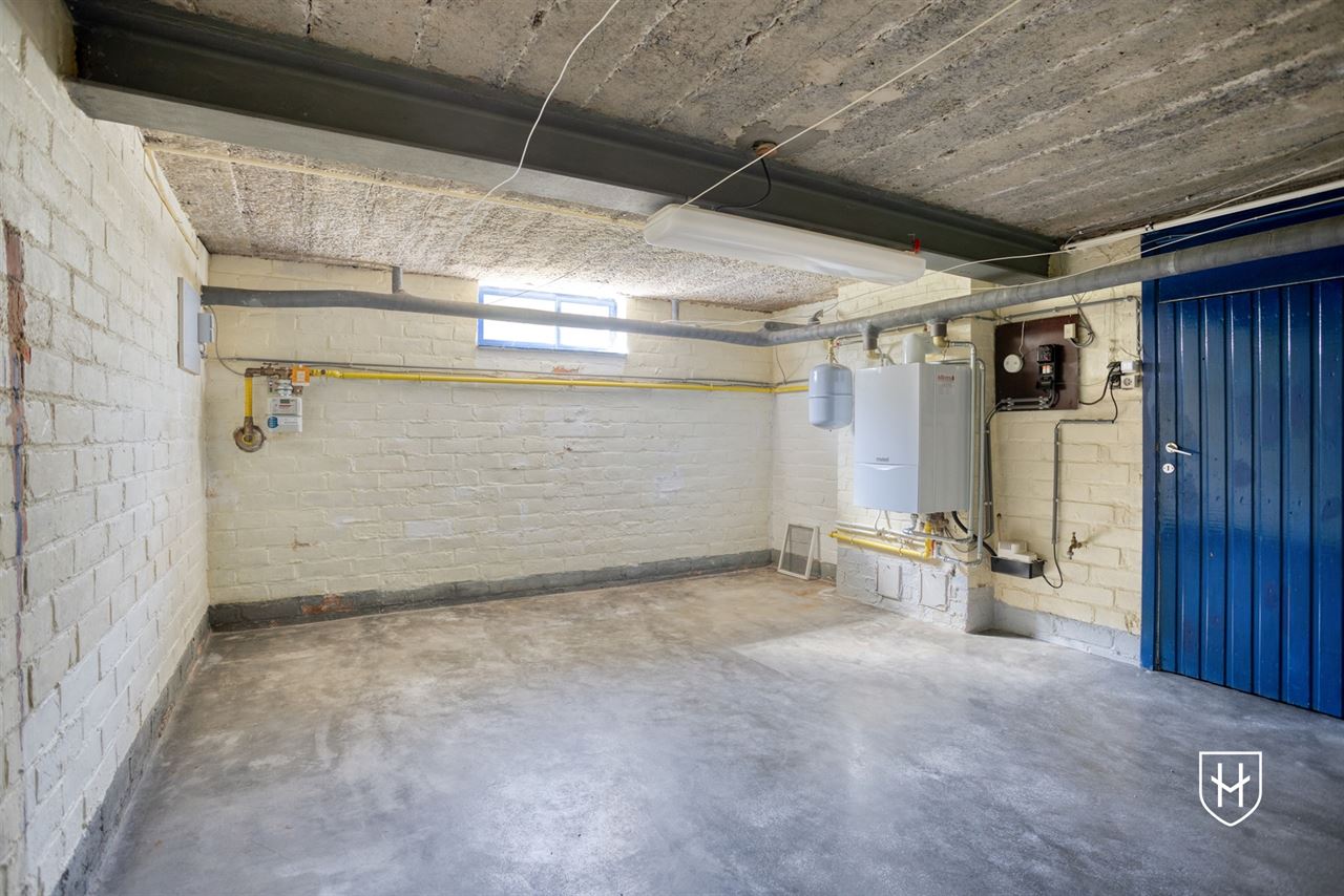 Goed onderhouden bungalowwoning met 3 slaapkamers, gelegen op een mooi perceel van maar liefst 10a 18ca, in een rustige en groene omgeving te Genk.