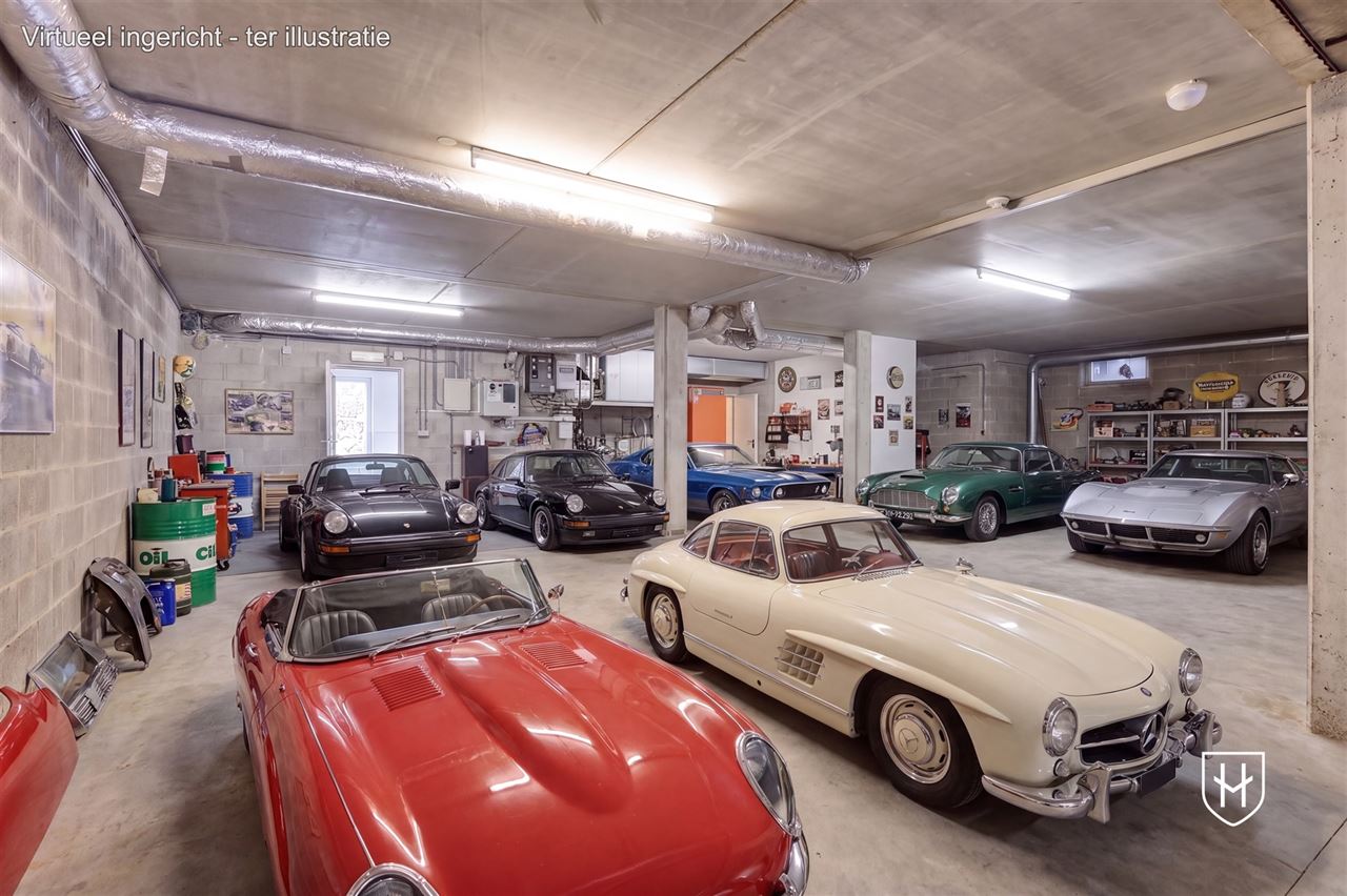 Architecturale villa met riante garage voor 10 wagens en binnenzwembad, op een schitterend perceel van 28a 89ca, prominent gelegen in vermaarde villawijk te Maasmechelen