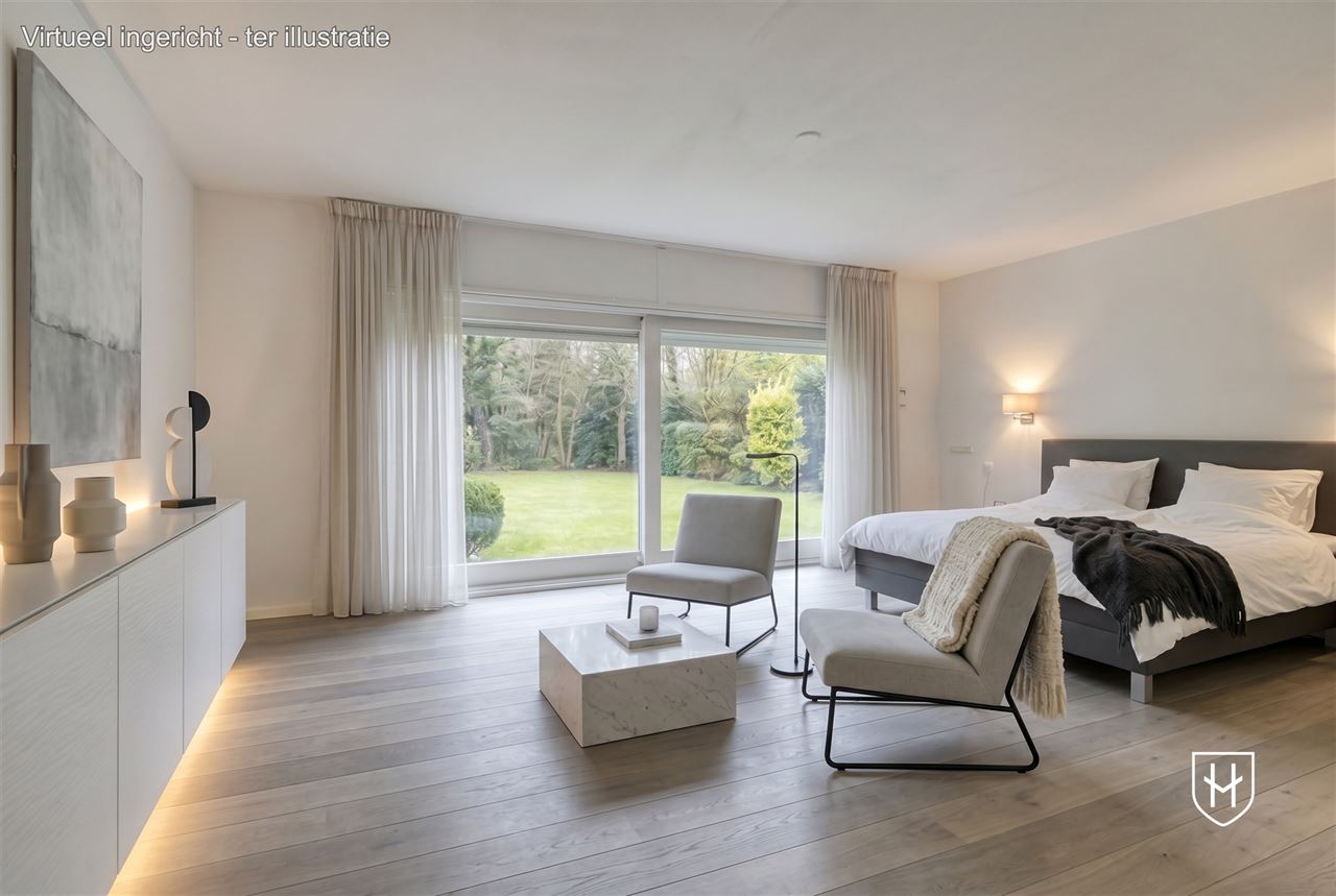 Architecturale villa met riante garage voor 10 wagens en binnenzwembad, op een schitterend perceel van 28a 89ca, prominent gelegen in vermaarde villawijk te Maasmechelen