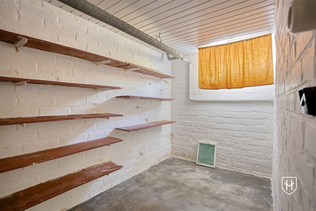 Goed onderhouden bungalowwoning met 3 slaapkamers, gelegen op een mooi perceel van maar liefst 10a 18ca, in een rustige en groene omgeving te Genk.