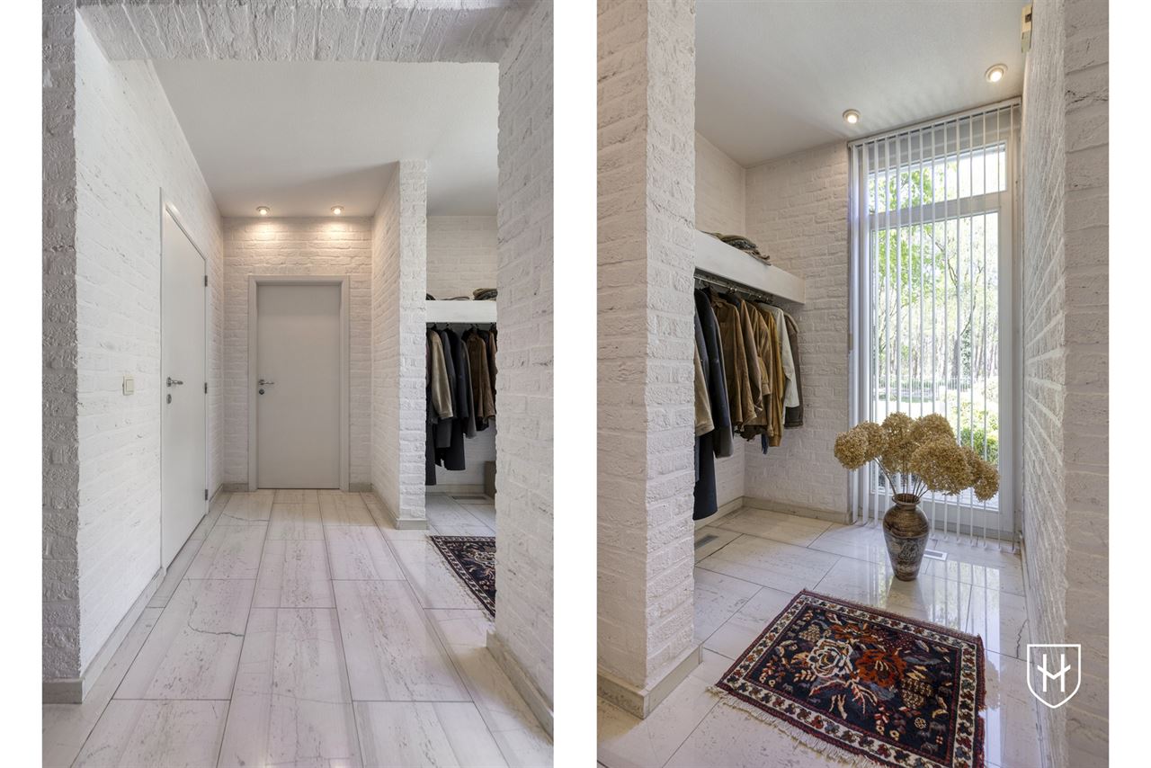 Architecturale villa met riante garage voor 10 wagens en binnenzwembad, op een schitterend perceel van 28a 89ca, prominent gelegen in vermaarde villawijk te Maasmechelen