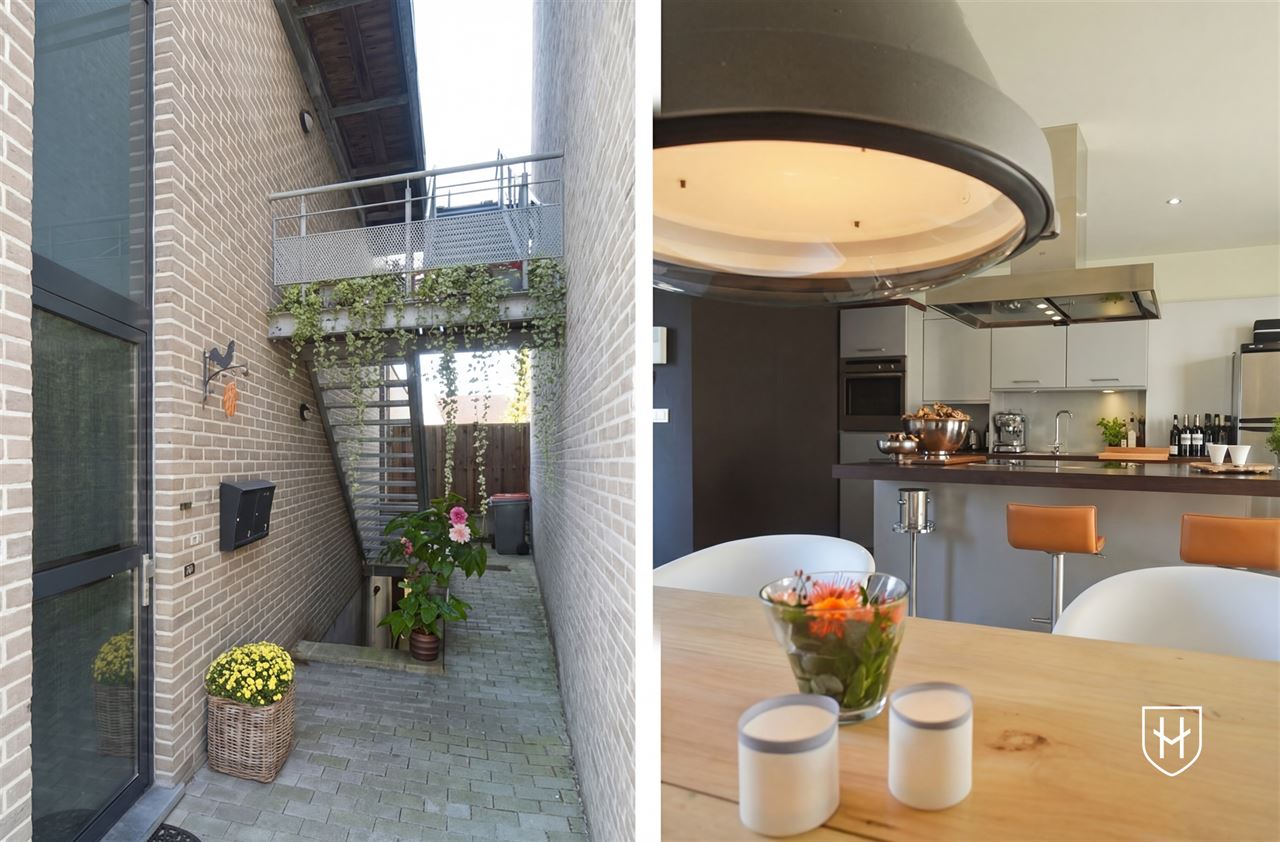 Schitterend penthouse met autostandplaats en riant terras, uniek gelegen in het historische stadscentrum van Stokkem