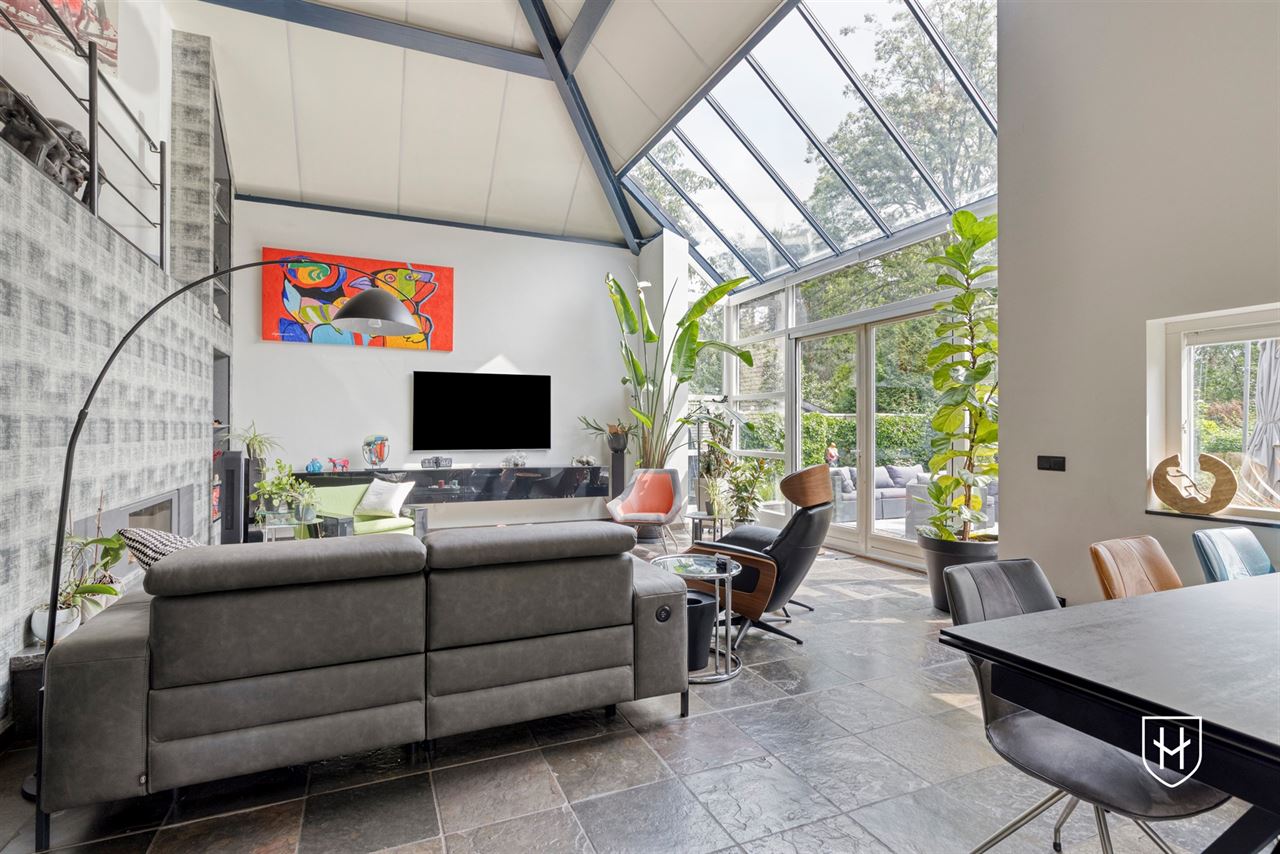 Architectural home with impressive living space with optimal garden contact and a special park garden with swimming pond with an exceptional nature experience