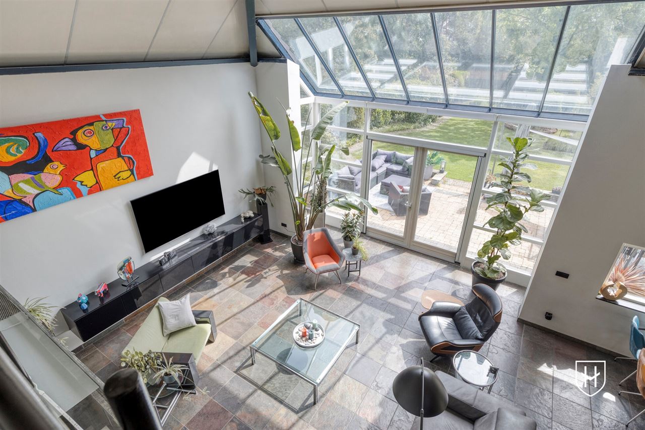 Architectural home with impressive living space with optimal garden contact and a special park garden with swimming pond with an exceptional nature experience