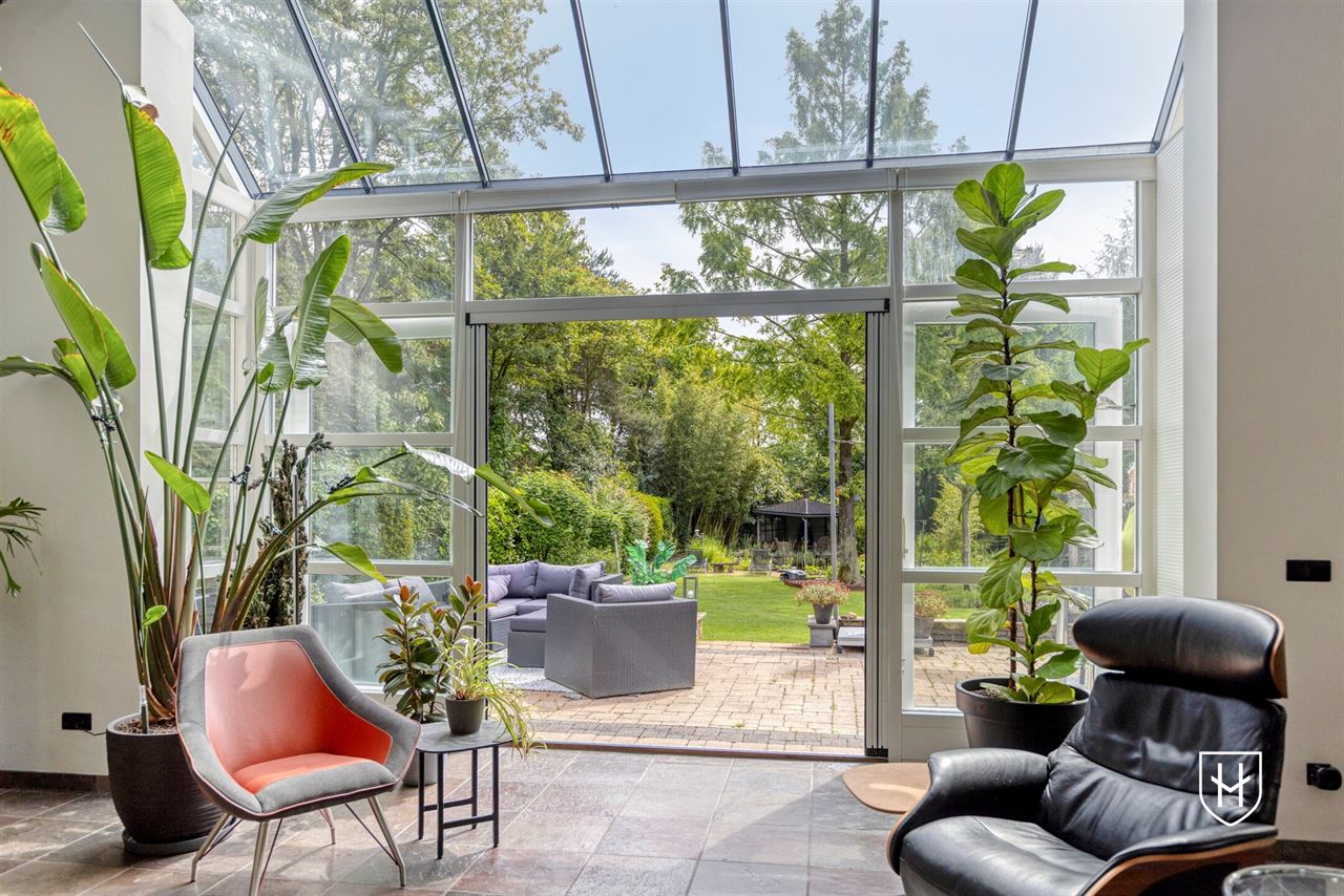 Architectural home with impressive living space with optimal garden contact and a special park garden with swimming pond with an exceptional nature experience
