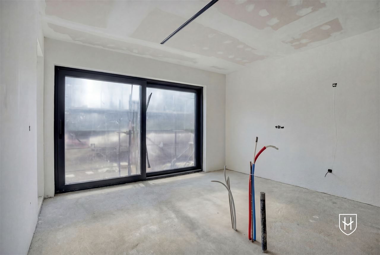 Spacieuse maison casco de construction récente avec 4 chambres et 2 salles de bain, sur un emplacement de choix à Lanaken-Neerharen