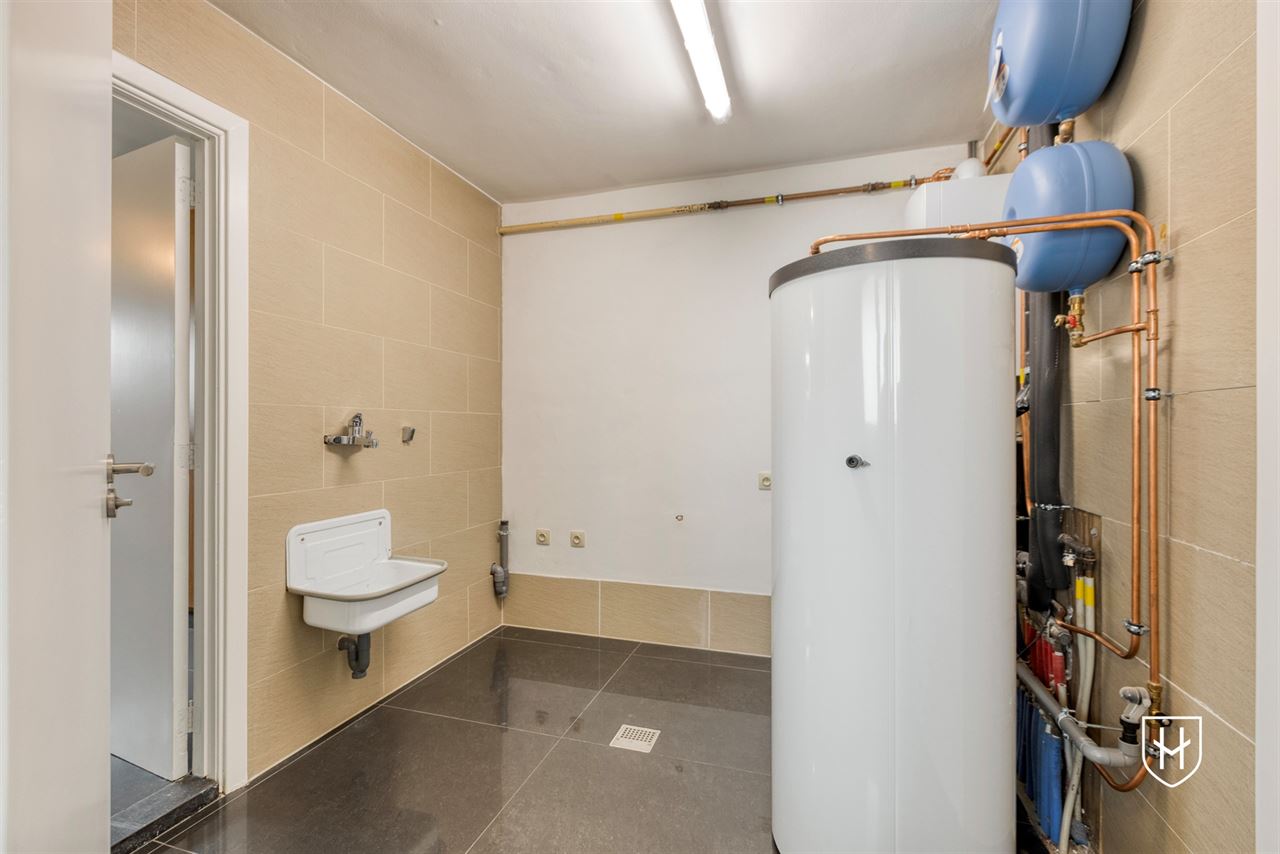 Luxueuze gemoderniseerde energiezuinige gezinswoning met 3 slaapkamers op een mooi perceel te Hamont-Achel