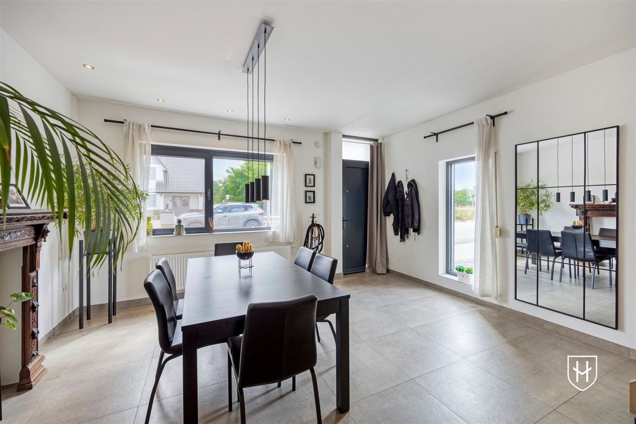A modern, move-in-ready family home with a garage, carport, and sunny garden in the popular Lanaken-Rekem neighborhood
