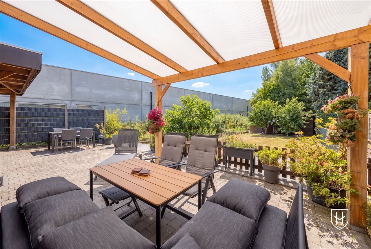 A modern, move-in-ready family home with a garage, carport, and sunny garden in the popular Lanaken-Rekem neighborhood