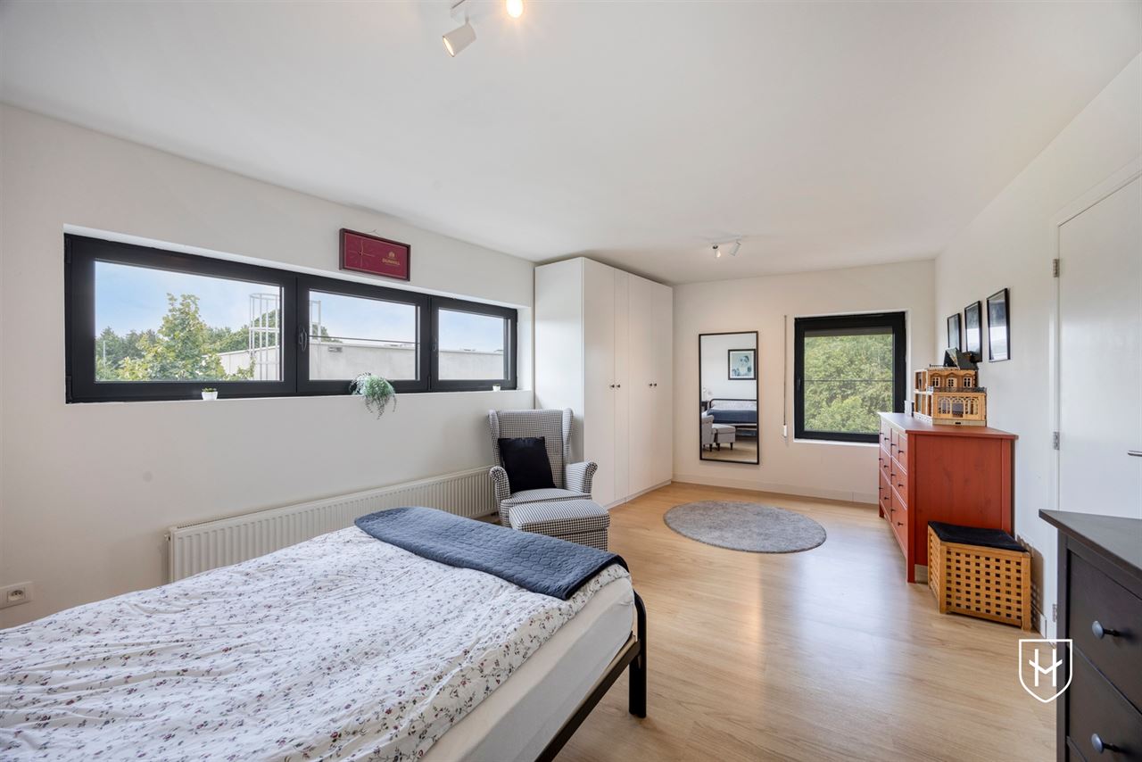 A modern, move-in-ready family home with a garage, carport, and sunny garden in the popular Lanaken-Rekem neighborhood