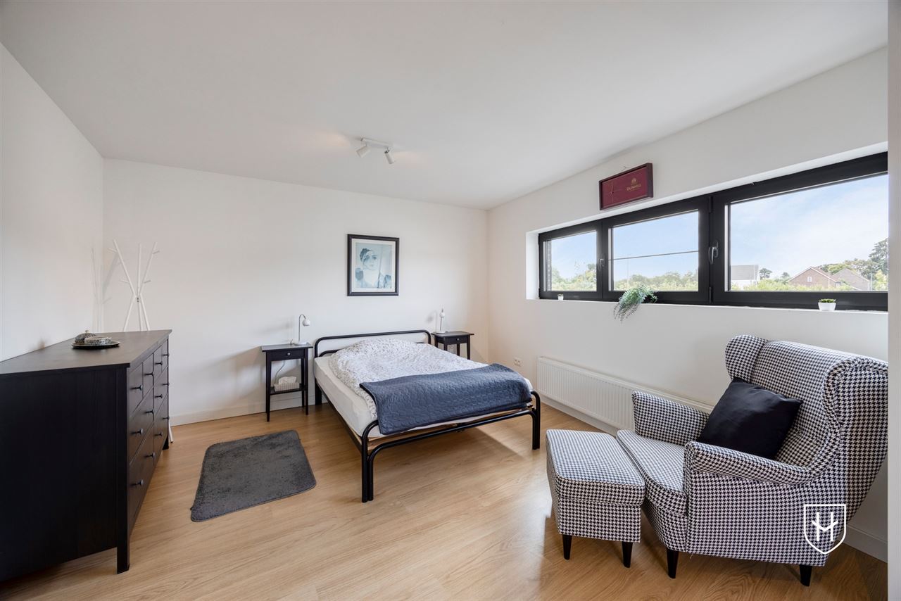 A modern, move-in-ready family home with a garage, carport, and sunny garden in the popular Lanaken-Rekem neighborhood