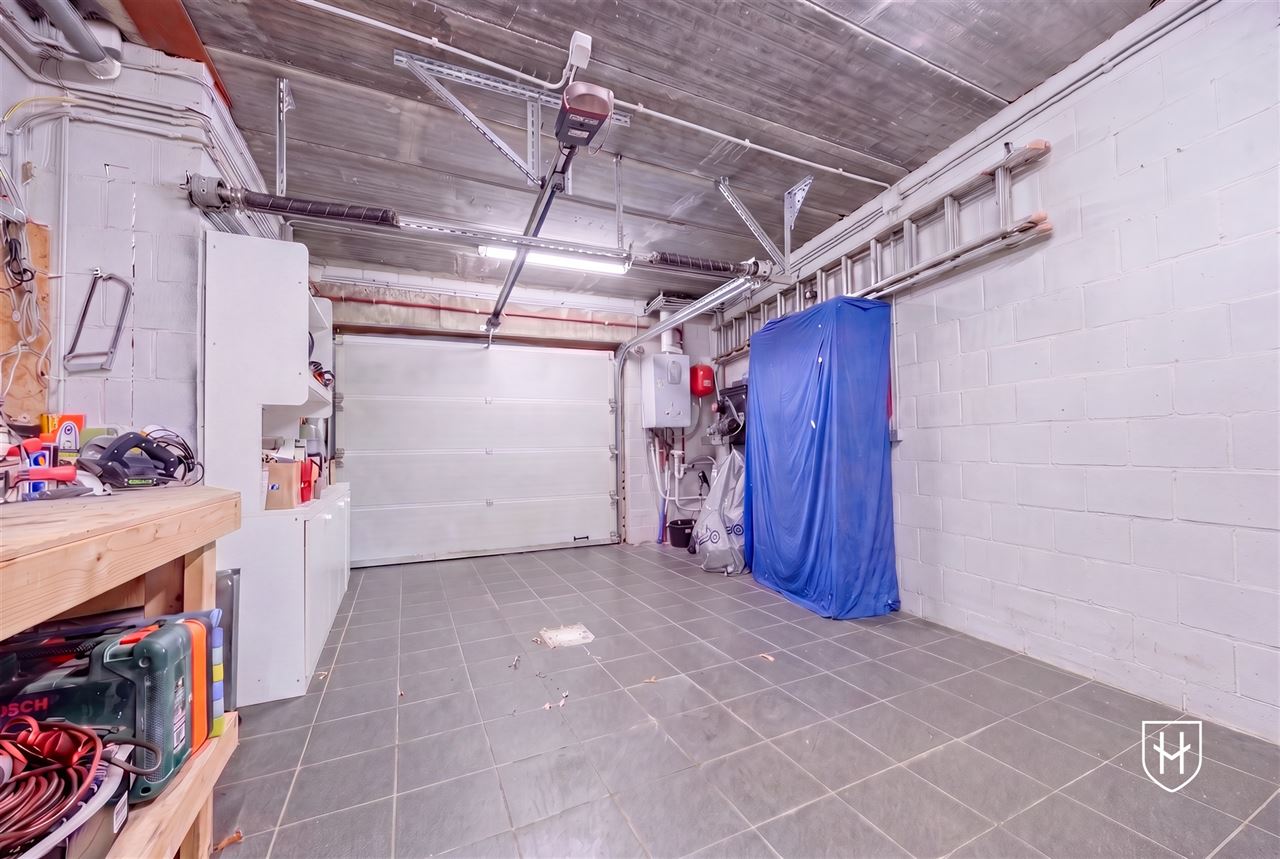 A modern, move-in-ready family home with a garage, carport, and sunny garden in the popular Lanaken-Rekem neighborhood