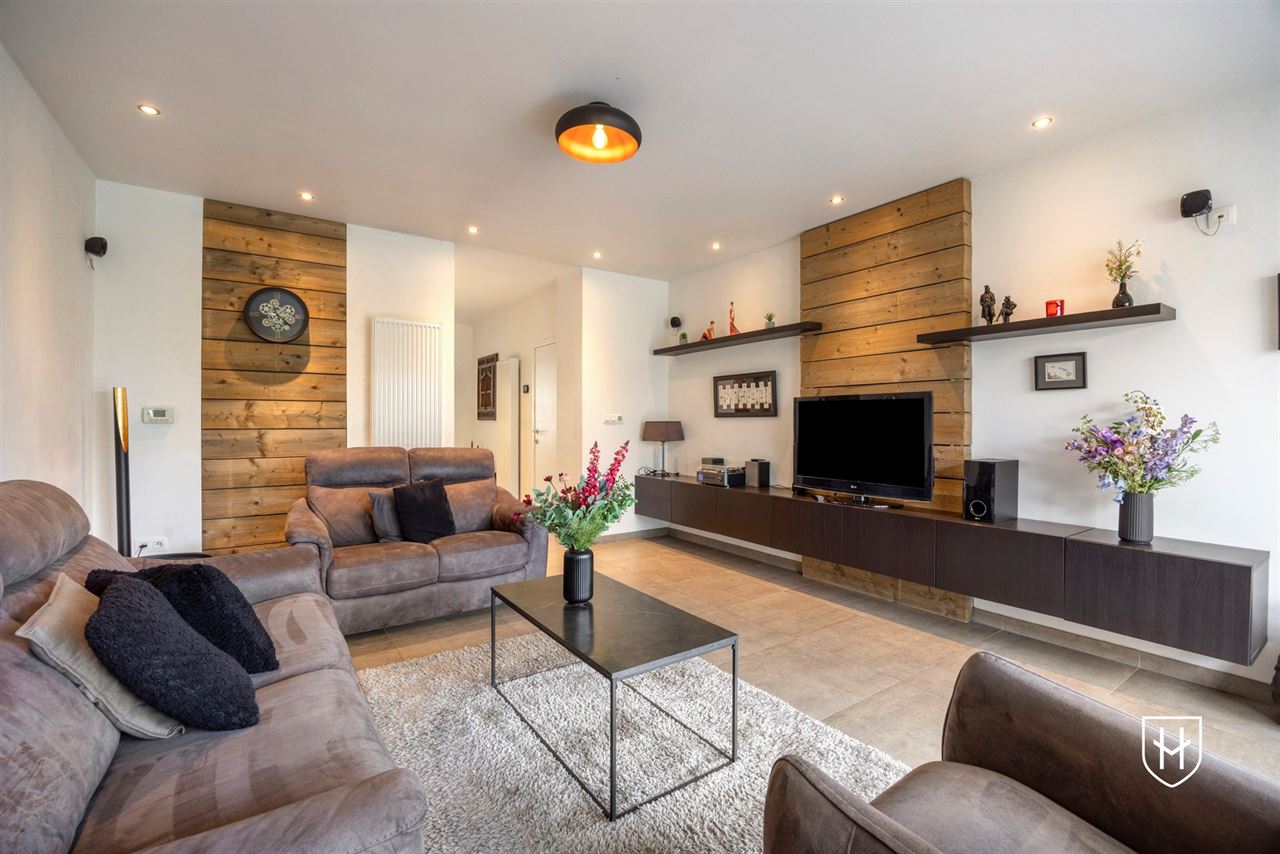 A modern, move-in-ready family home with a garage, carport, and sunny garden in the popular Lanaken-Rekem neighborhood
