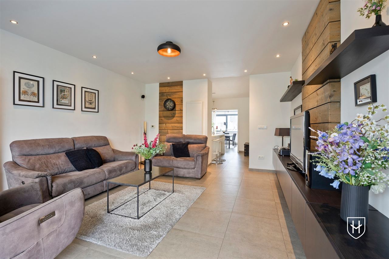 A modern, move-in-ready family home with a garage, carport, and sunny garden in the popular Lanaken-Rekem neighborhood