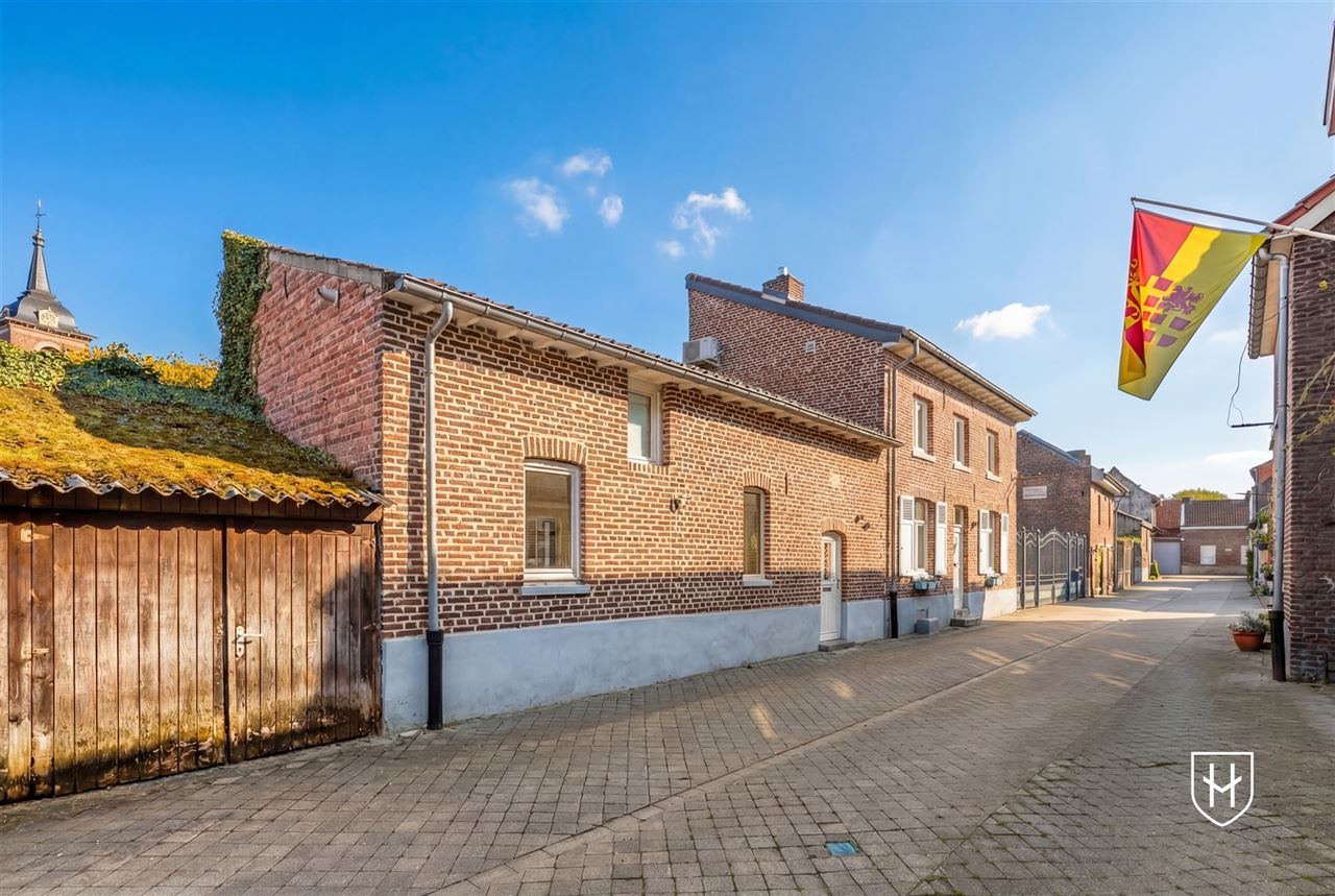 Bijzonder charmante woonbeleving bestaande uit twee woonentiteiten op een gegeerde locatie in het centrum van Oud-Rekem